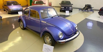 Comprehensive Volkswagen Super Beetle historical archive and model evolution timeline at SuperBeetles.com.